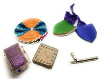 A Collection Vintage Pin Cushions and Needle Holders